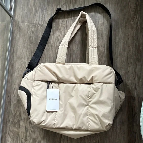 NEW WITH TAGS- Calpak Luka Duffel Oatmeal - Picture 3 of 5